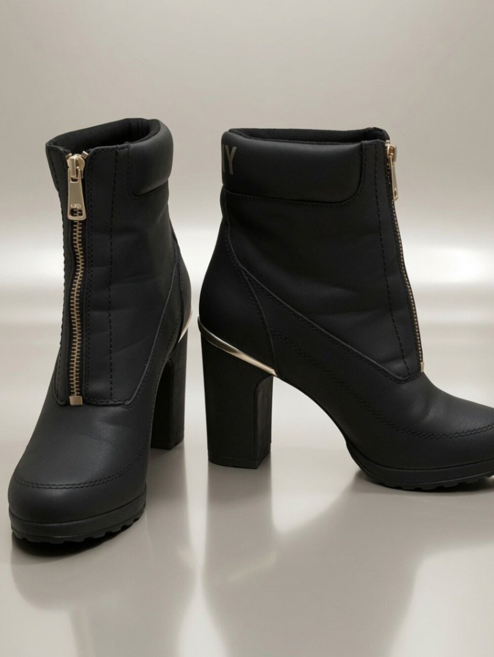 DKNY Size 8 NWOT Black & Gold 4 Inch High Heel Booties